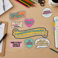 All 8 School OT stickers flat lay on OT desk mockup